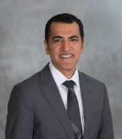 Photograph of Andrew Kalra, Chief Financial Officer